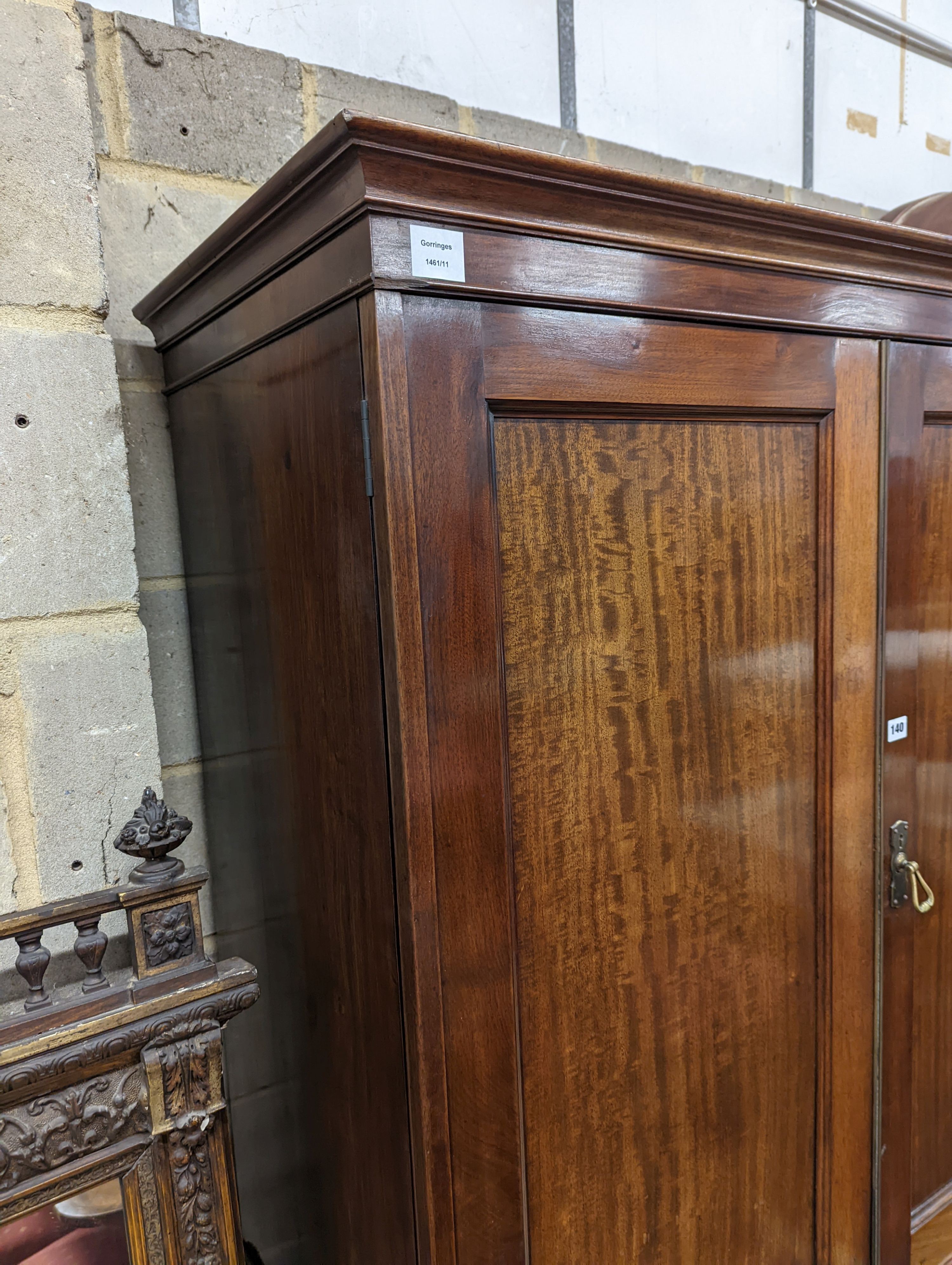 An early 20th century mahogany linen press, length 112cm, depth 56cm, height 109cm